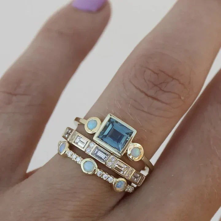 Conjunto de anillos vintage con circonita azul